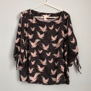 Cute blouse with peek-a-boo sleeves